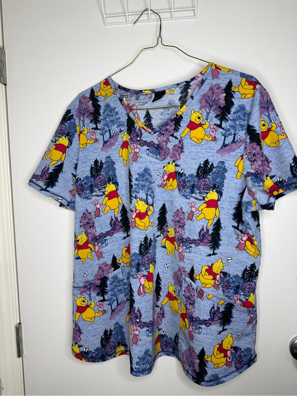 ❤️2 for $25❤️Disney Winnie the Pooh Graphic V-Neck Scrub Top in Light Blue